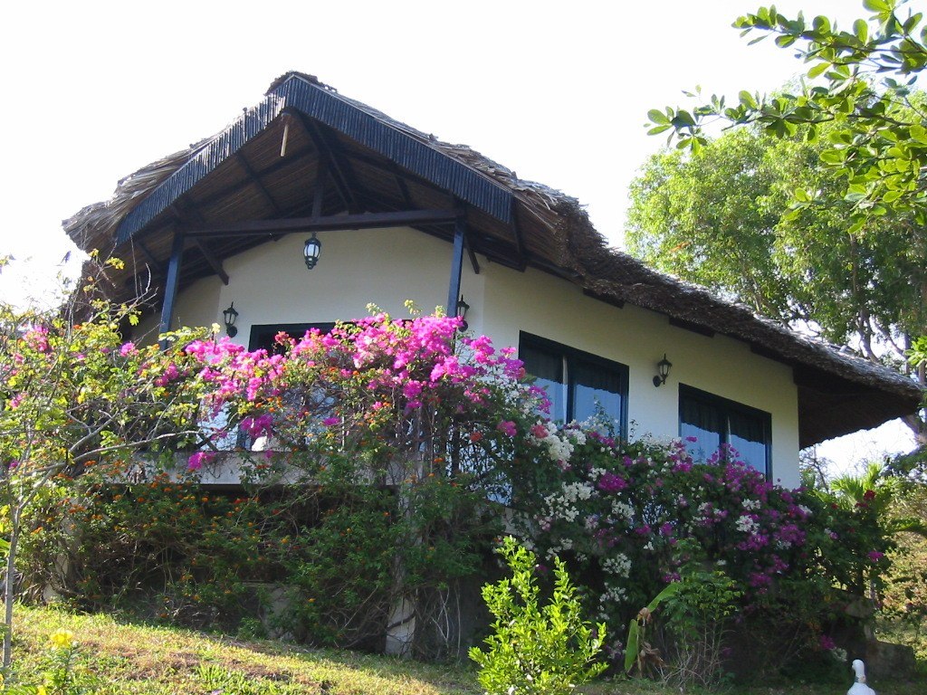 The exterior of our
            Bungalow, located high on the hill